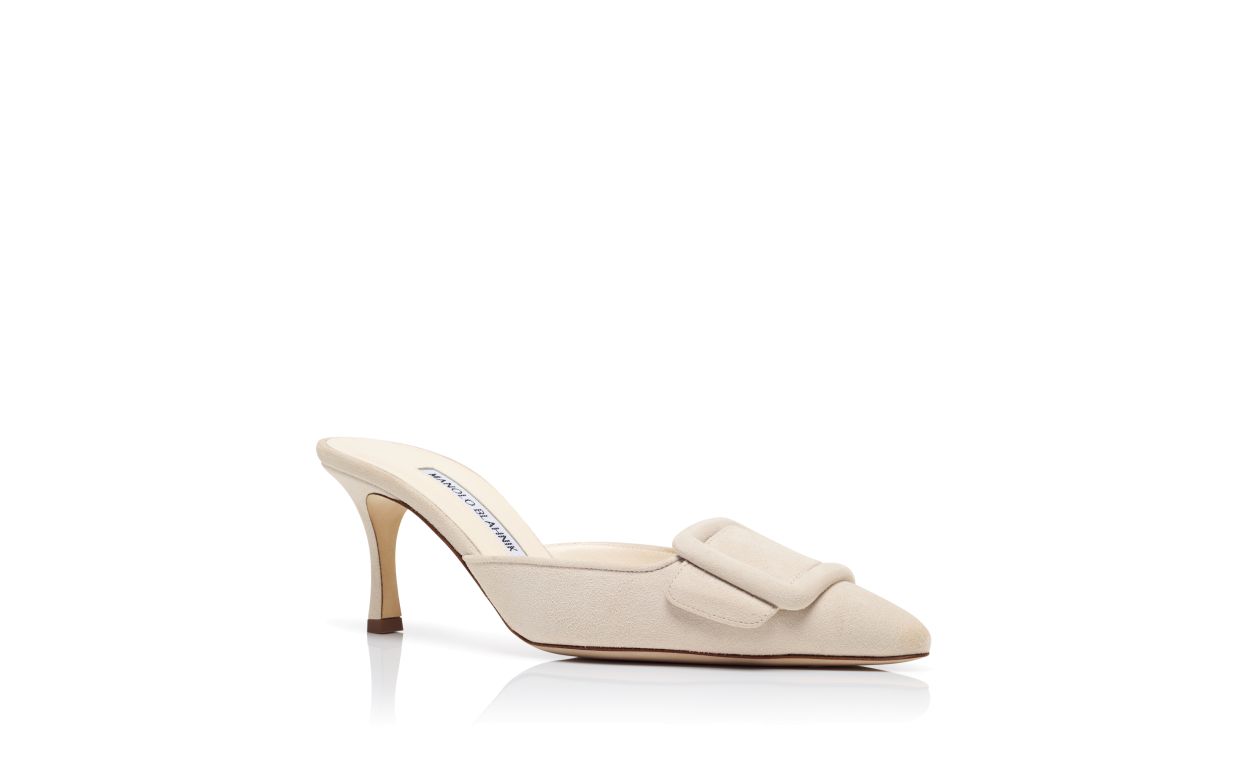 Mules en daim crème clair avec détail de boucle