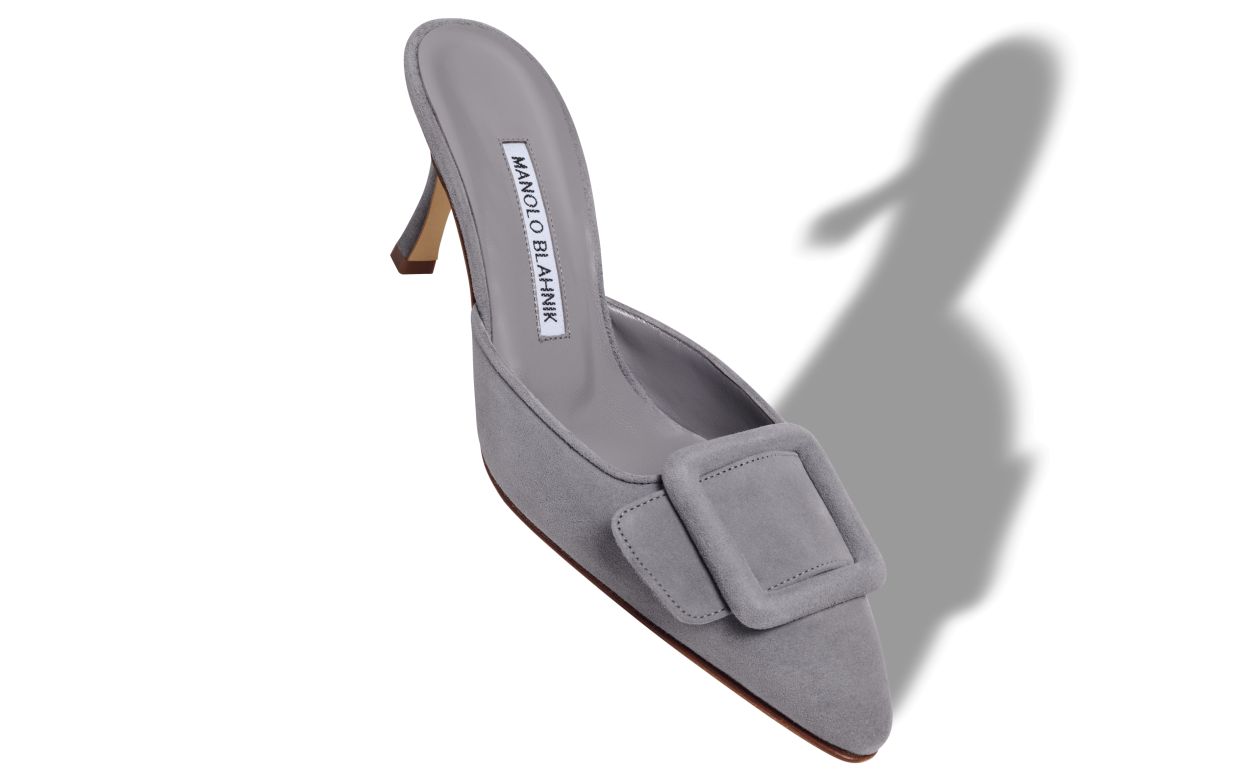 Mules en daim gris avec détail de boucle