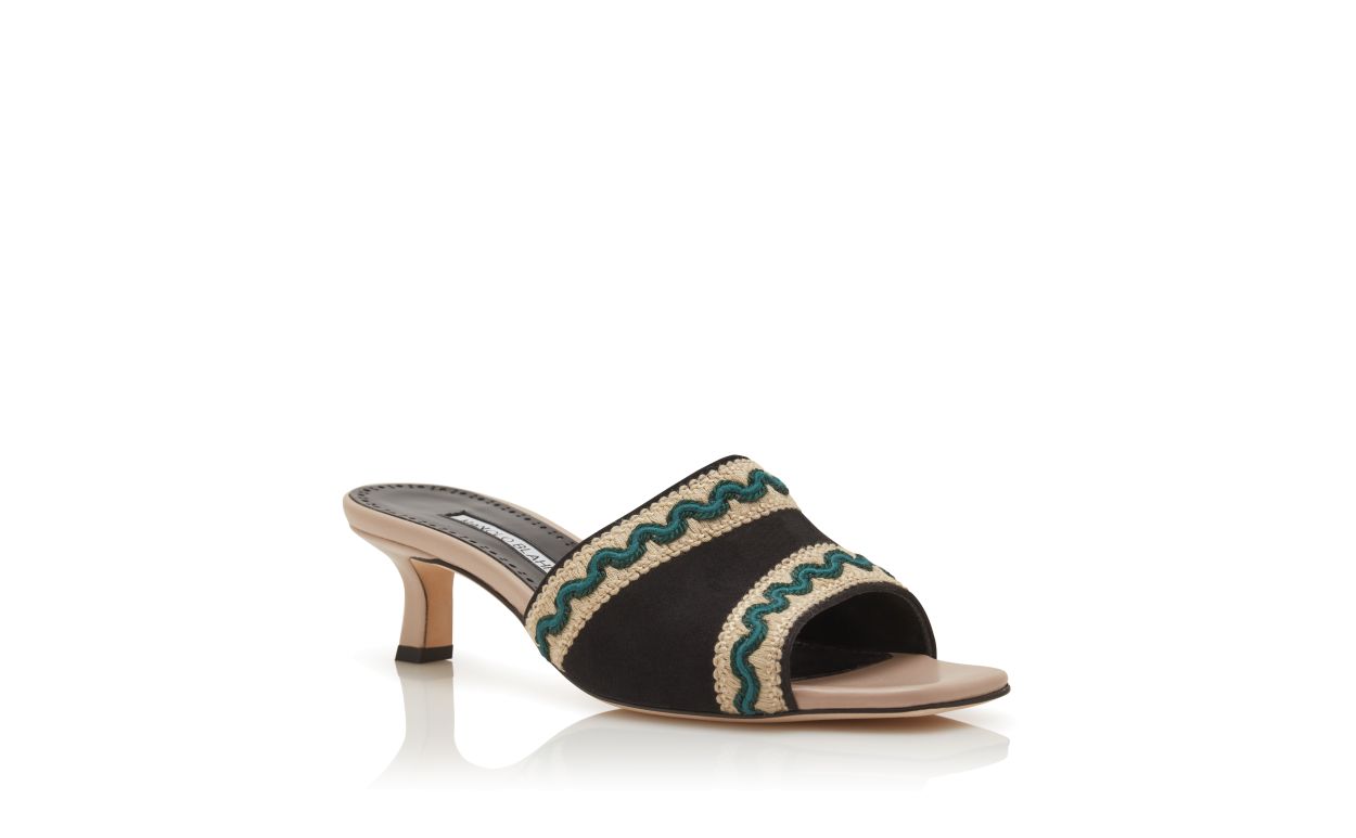 Mules en daim beige clair et noir avec détails ajourés en maille