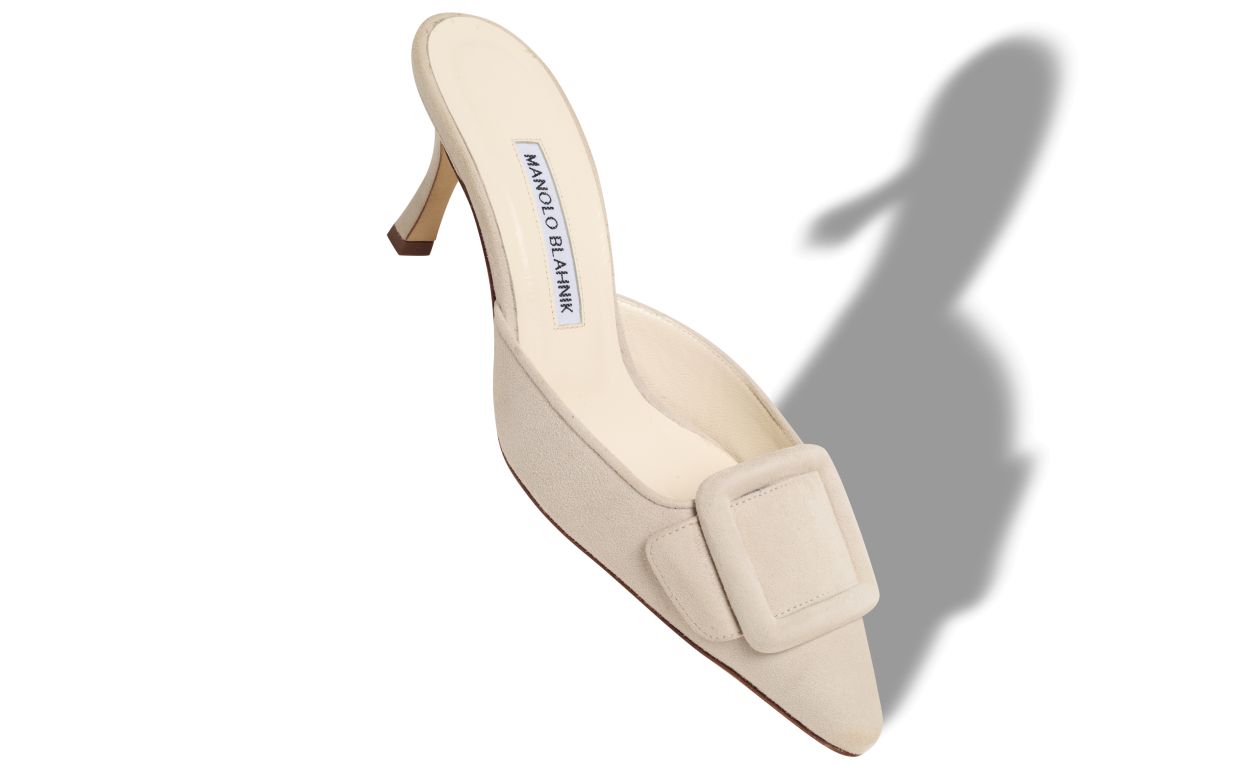 Mules en daim crème clair avec détail de boucle